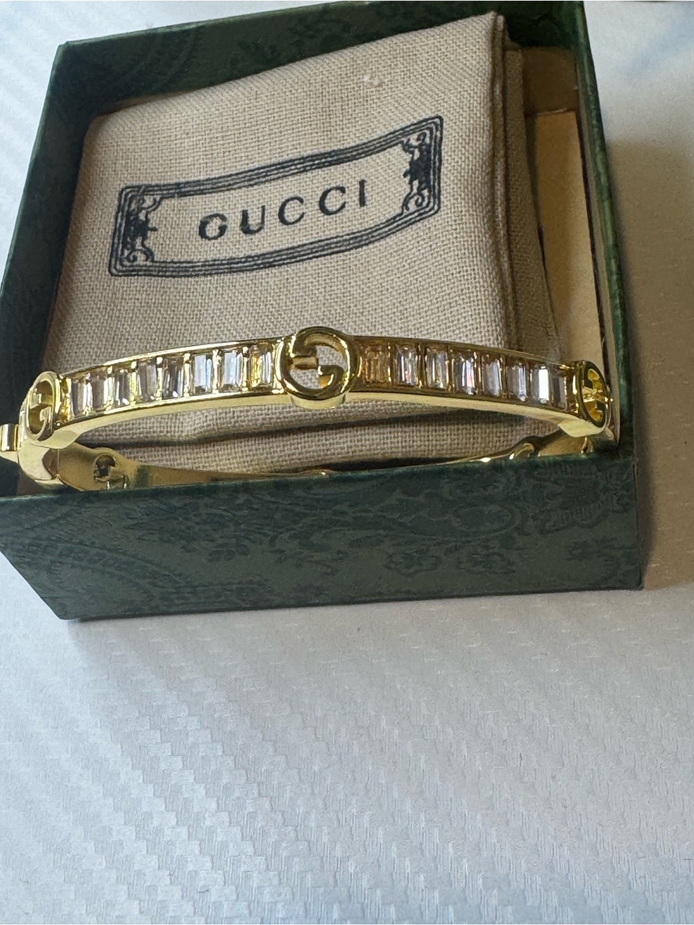 Gucci Gold Bracelet with Clear Baguette Crystals and Interlocking Gs - Picture 3 of 7